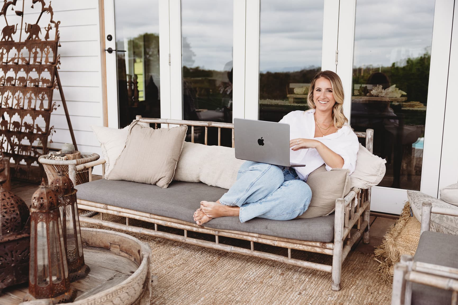 Jess Clark working from home with her laptop